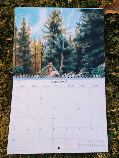 Calendar with a forest design on grass